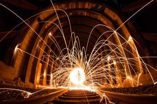 steel wool photography between concrete wall