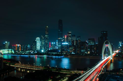 landscape photography of bridge near high-rise buildings