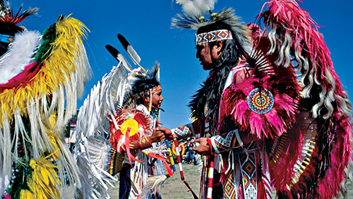 Photo by David Alan Harvey | Arizona | 1992 | Ceremonial dancers compete at a Native American powwow.