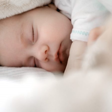 selective focus photography of sleeping baby