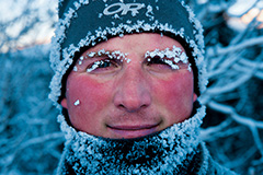 Paul Nicklen on assignment. Lewes Lake, Yukon Territory, Canada.